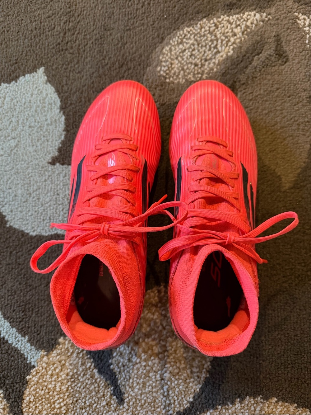 adidas Bright Coral women’s Athletic Cleats